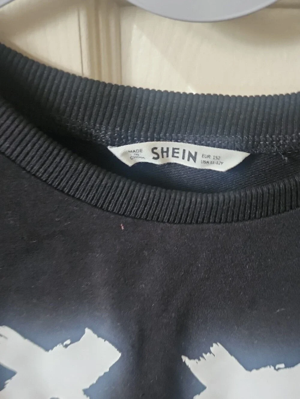 SHEIN Black Crewneck Sweatshirt with White Graphic Smile